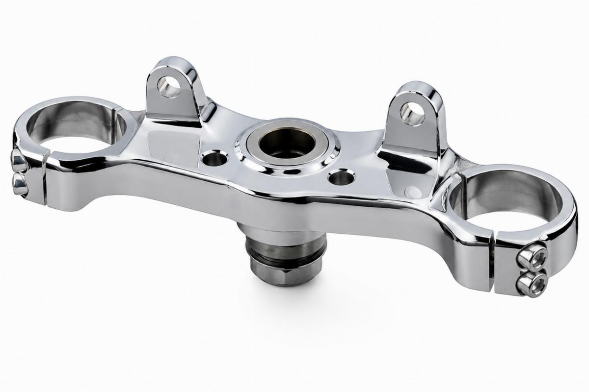 Chrome forged inline top triple tree for custom spring forks showing ear mounting points