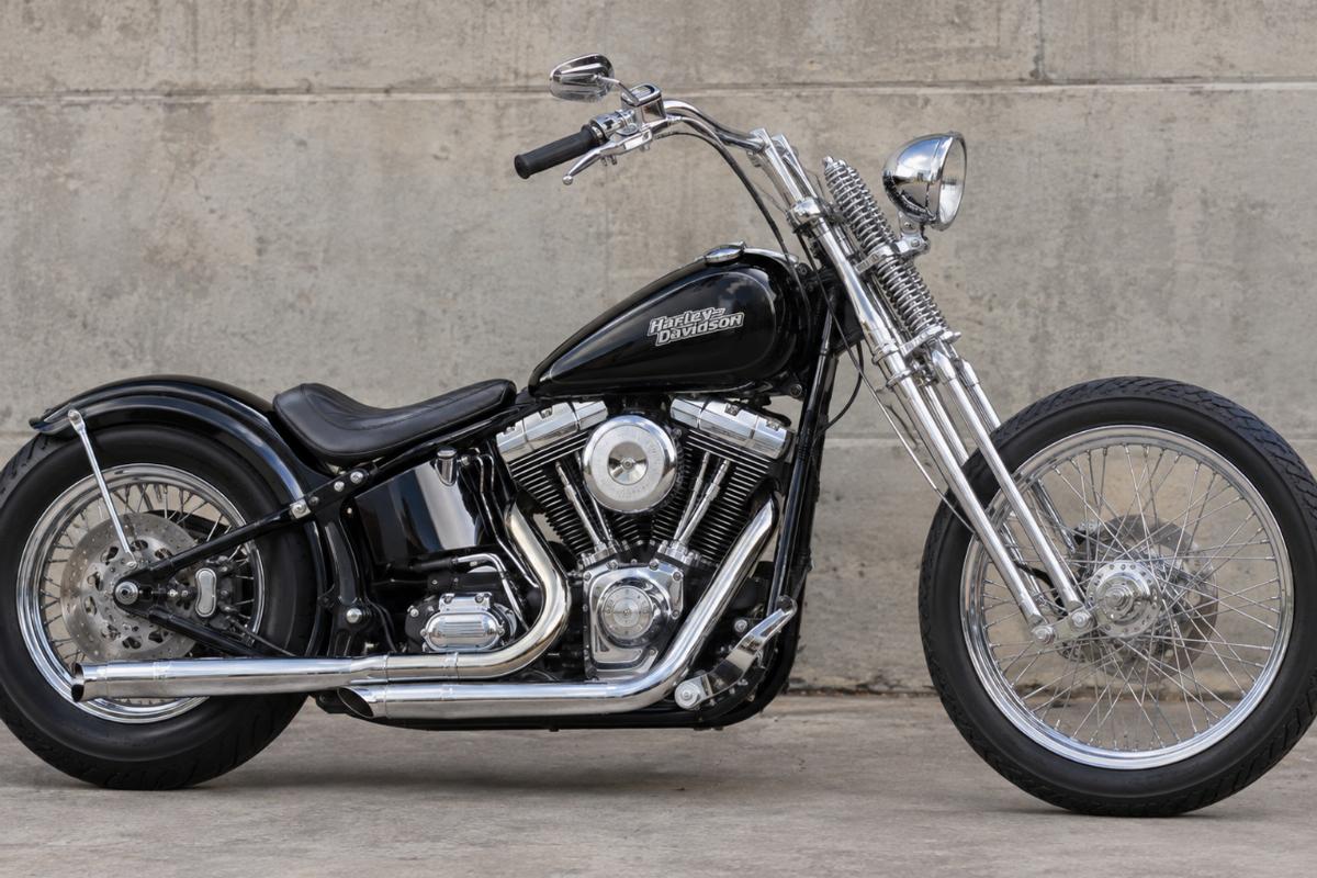 Chrome plated custom springer front end for FXST Softail side view