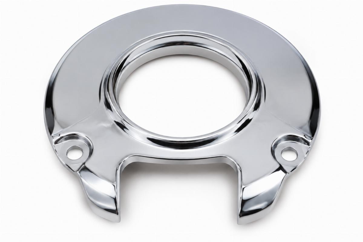 Chrome plated lower bearing dust shield for big twin front end assembly