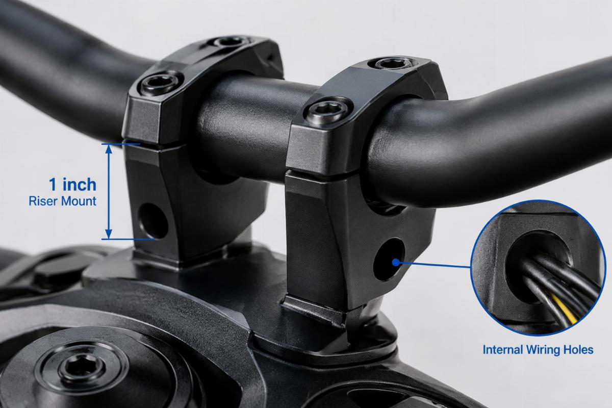 Close up detail of the 1 inch riser mount and internal wiring holes on the handlebar