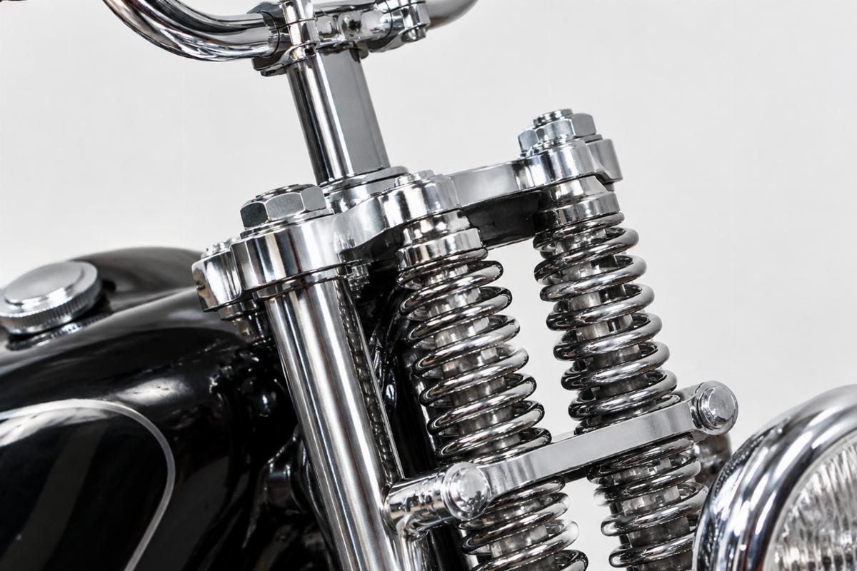 Close up of 1 inch stem and inline triple tree on chrome springer fork