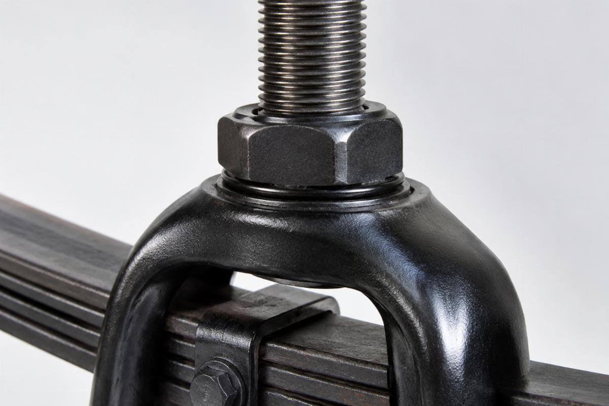 Close up of 1 inch x 24 threaded stem and top crown nut on leaf spring fork
