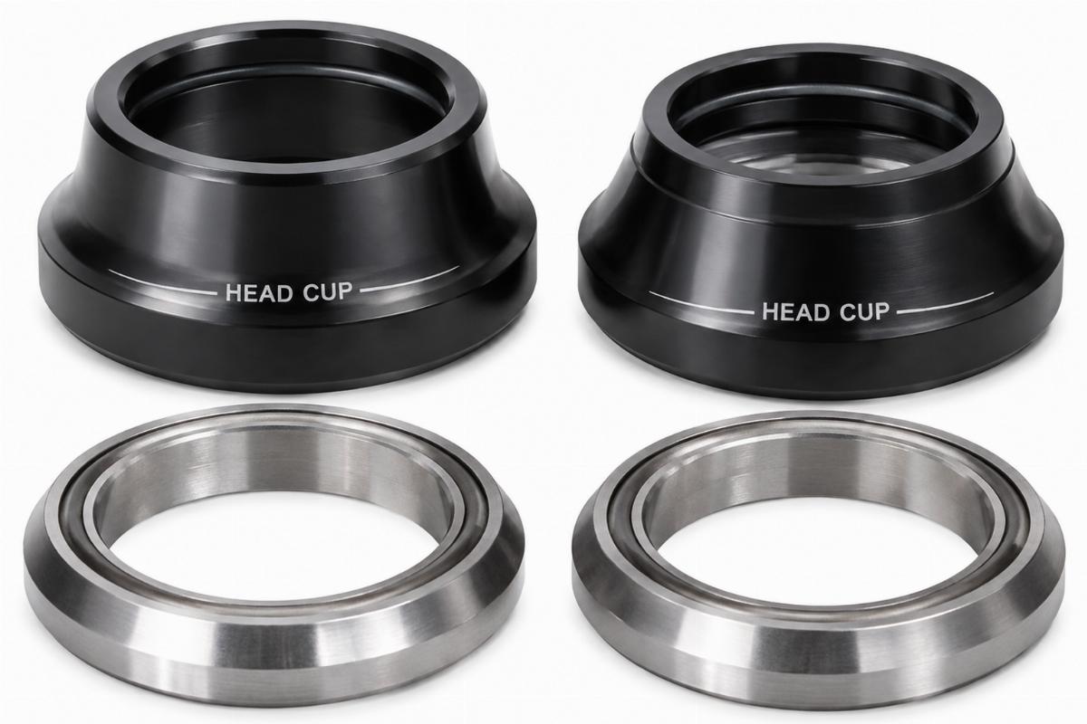 Close up of both head cups and bearing races included in the conversion kit