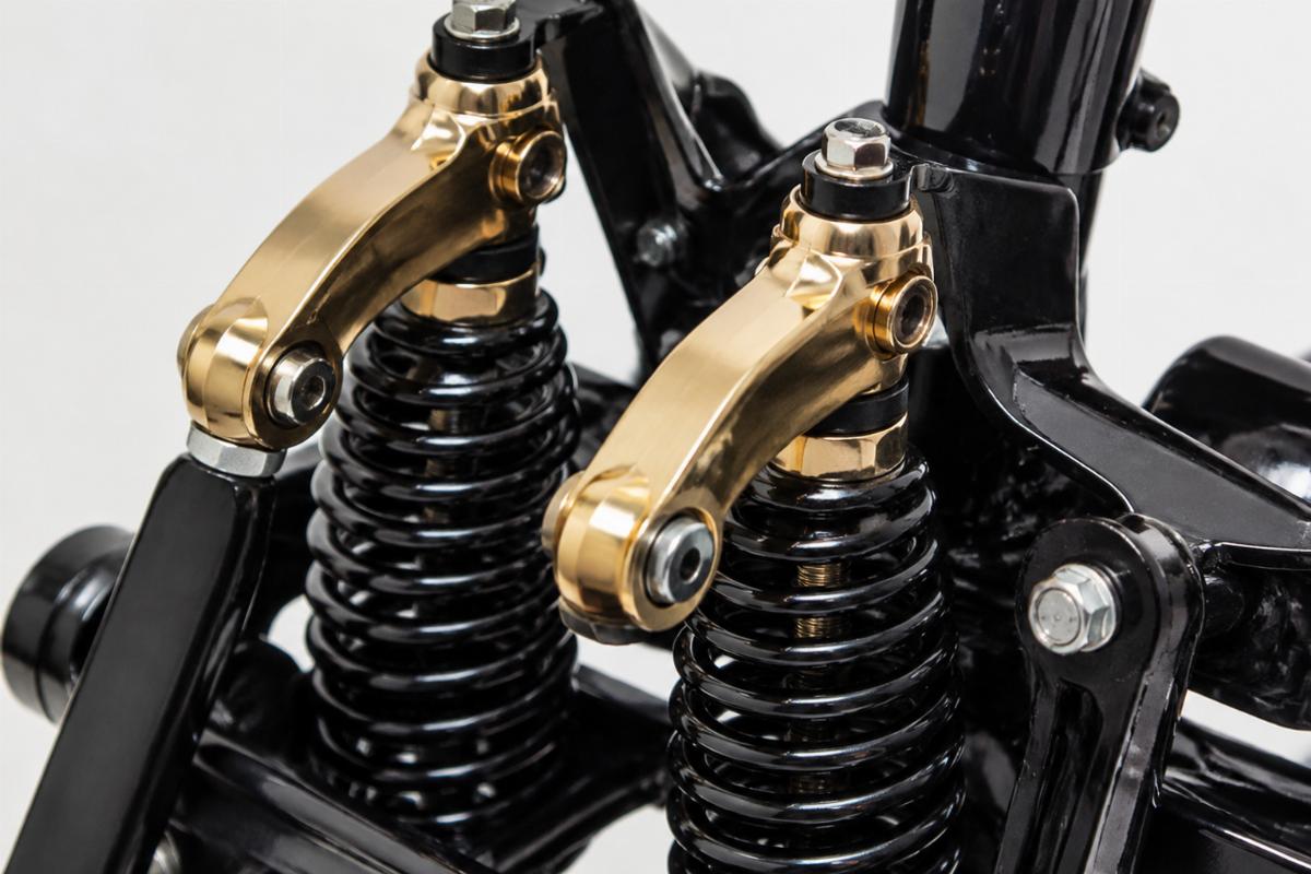 Close-up of brass plated rockers and springs on the black springer kit