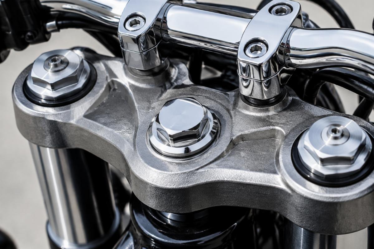 Close-up of chrome finish and forged surface on an inline top triple tree