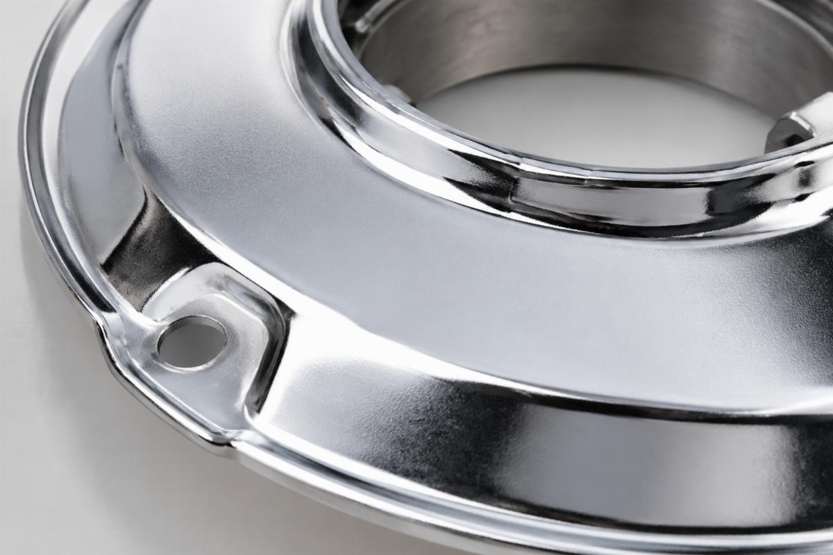 Close up of chrome plating on upper bearing dust shield
