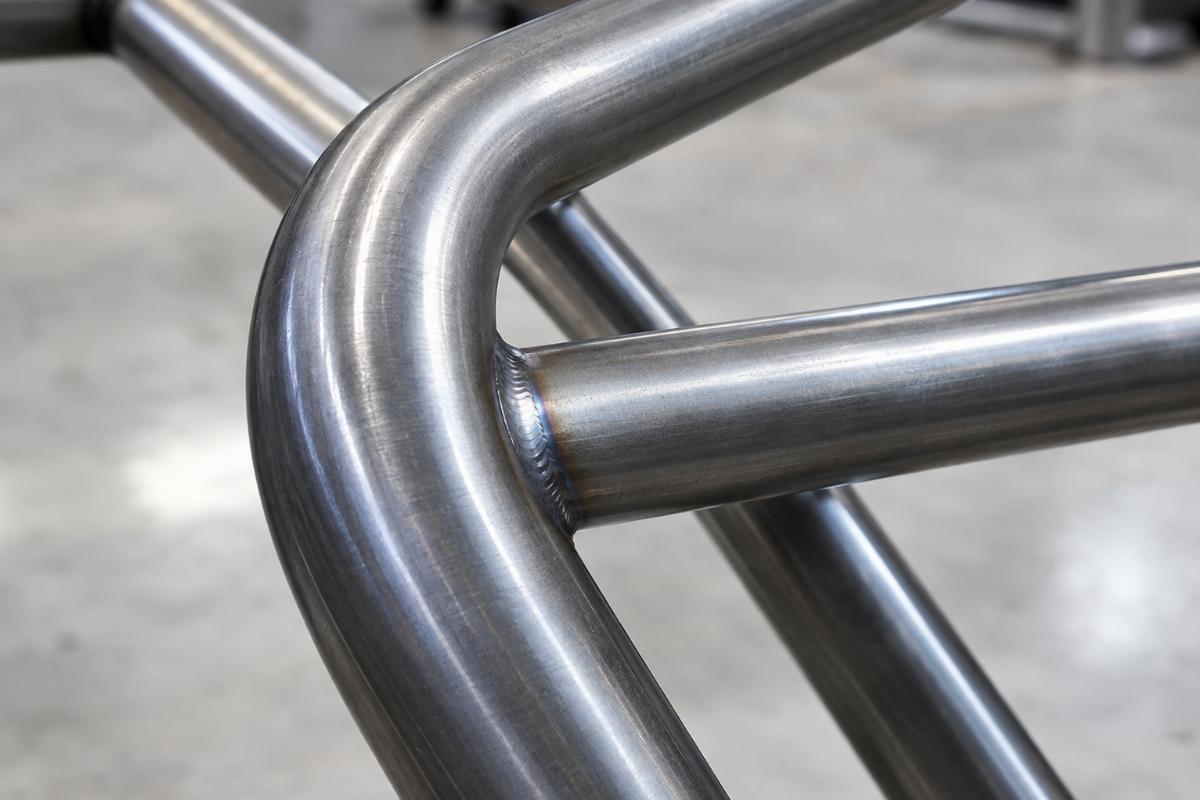 Close-up of CNC-mandrel bent steel tubing and crossbar details
