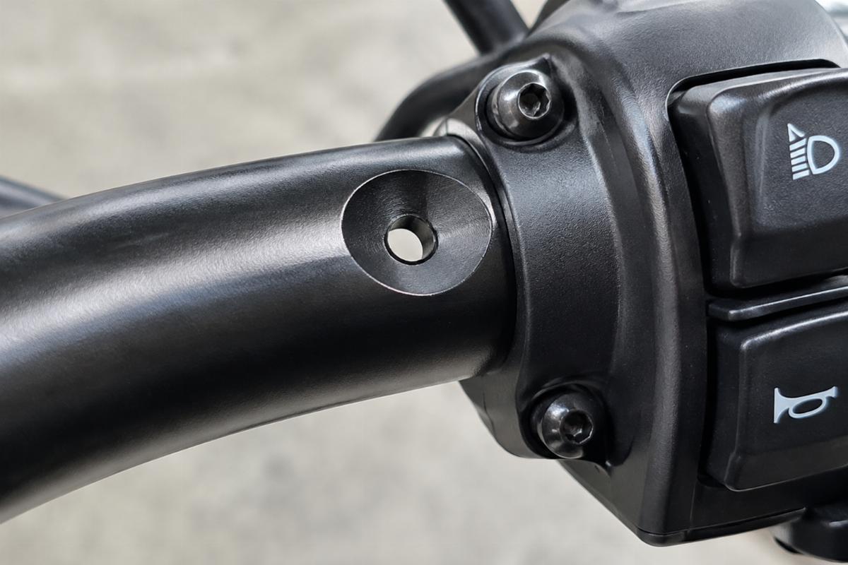 Close up of dimpled and drilled switch area on 1 1/4 inch handlebars