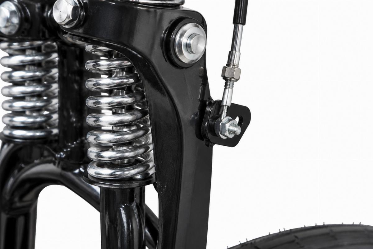 Close up of non offset right rocker and right side brake tab on springer fork