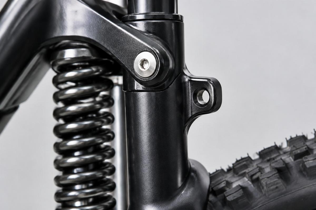 Close up of right side brake tab and non-offset rocker on inline spring fork