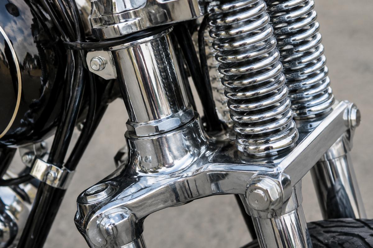Close up of steering stem and lower tree on chrome springer fork