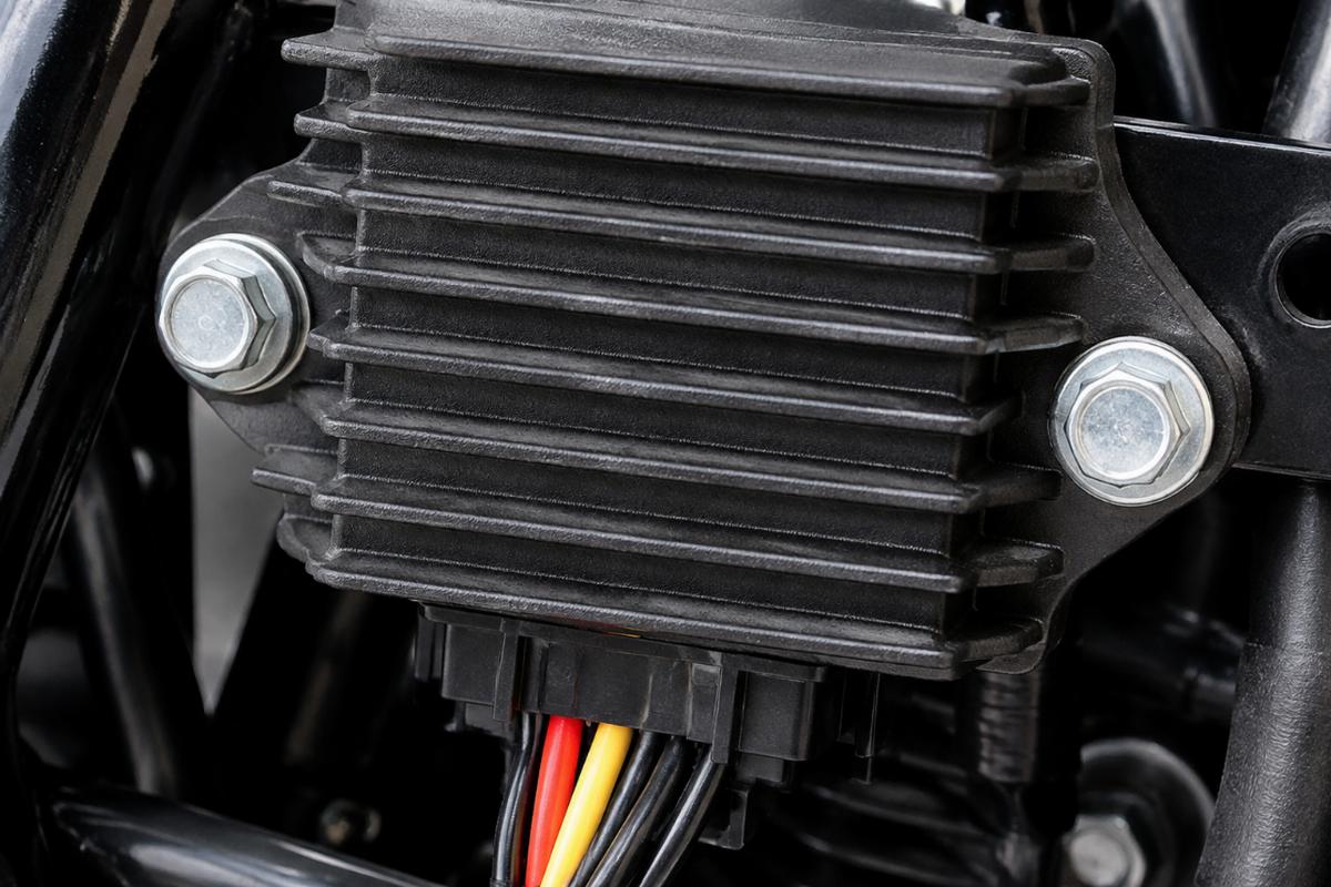 Close up of the two bolt mount on the regulator/rectifier