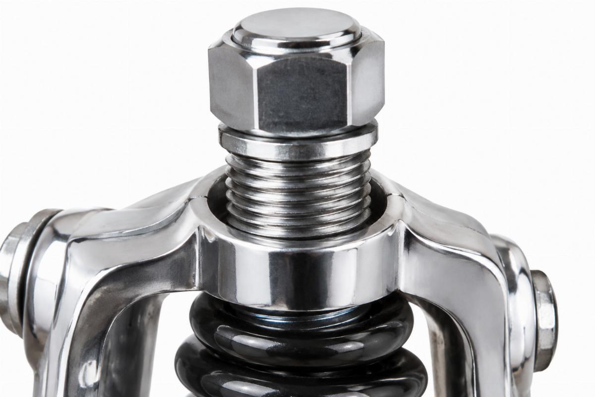 Close up of top crown nut set for springer front ends threads