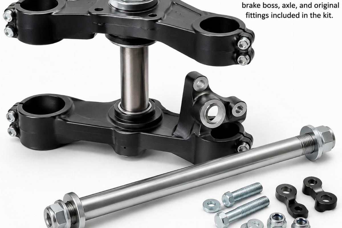 Close up of triple tree, brake boss, axle, and original fittings included in the kit