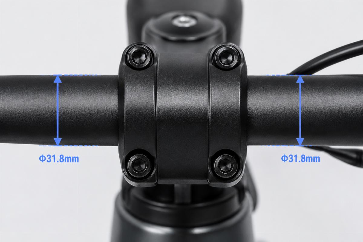Close-up view of control clamp area on handlebars showing diameter consistency