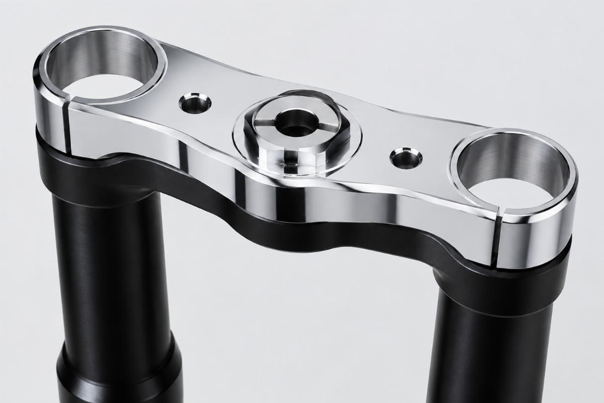 detail of machined chrome top triple tree without ears and black finish legs