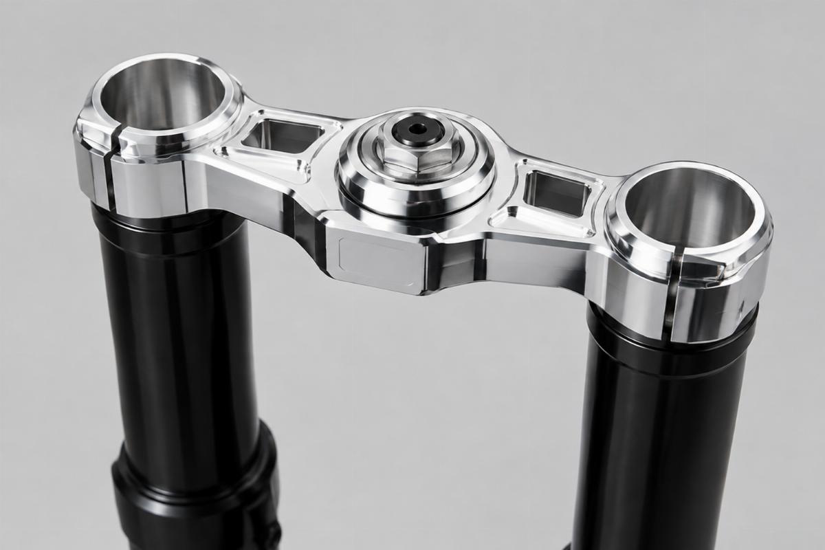 Detail of the machined chrome top triple tree without ears and black fork legs