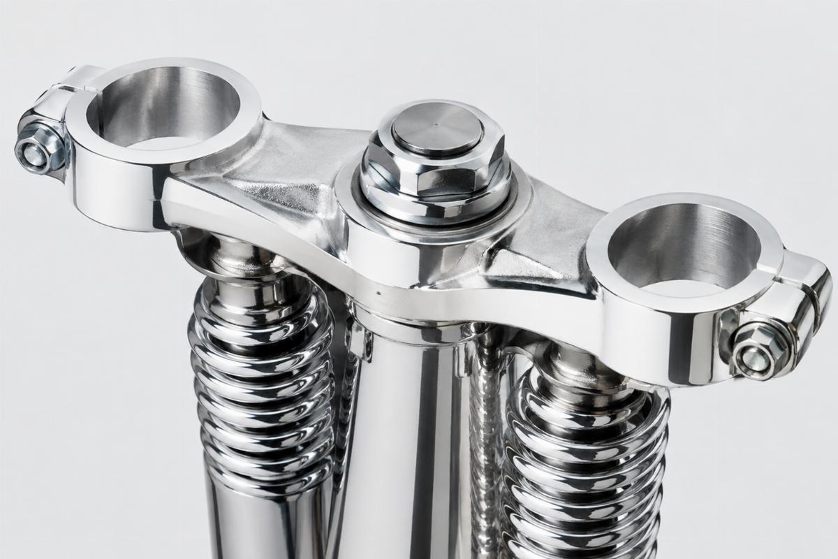 Detail view of forged inline top tree for spring fork chrome finish