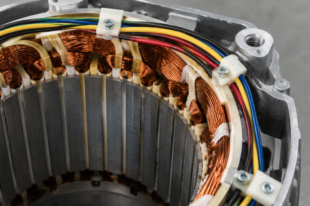 Detailed shot of unmolded stator mounting points and wire routing