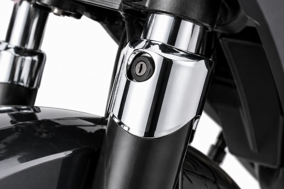 Detailed view of the chrome finish on the fork lock cover
