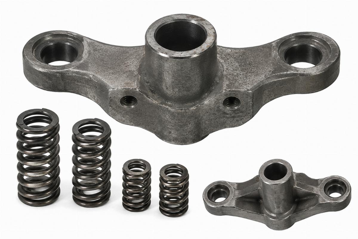 Detailed view of unpolished rear fork stem cross plate and included springs