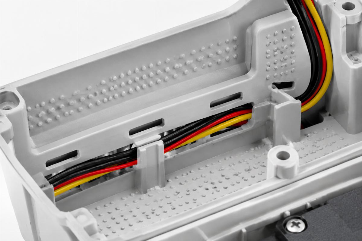 Dimpled and slotted control area detail for internal wiring