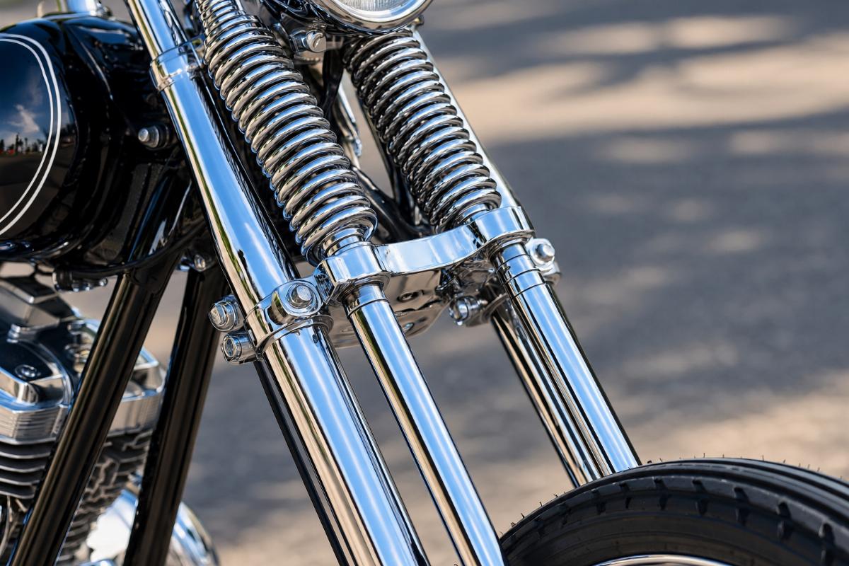 English alt describing chrome finish detail on springer fork legs